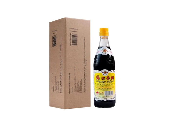 Gold Plum Chinkiang Vinegar bottle beside its shipping carton